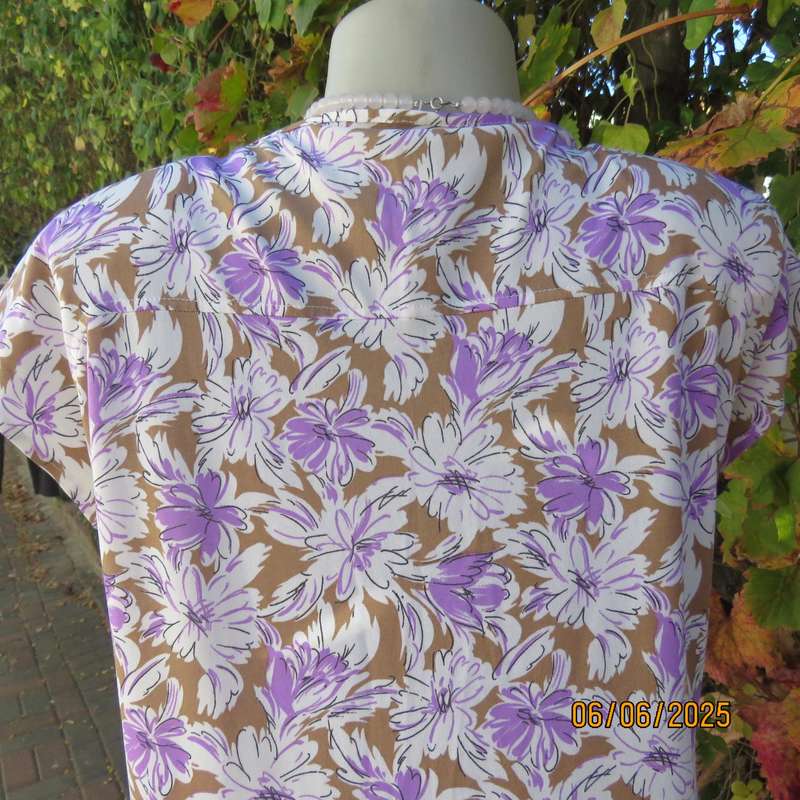 Vintage drop waist stretch polyester dress in tan with white-lilac flowers. Size 38