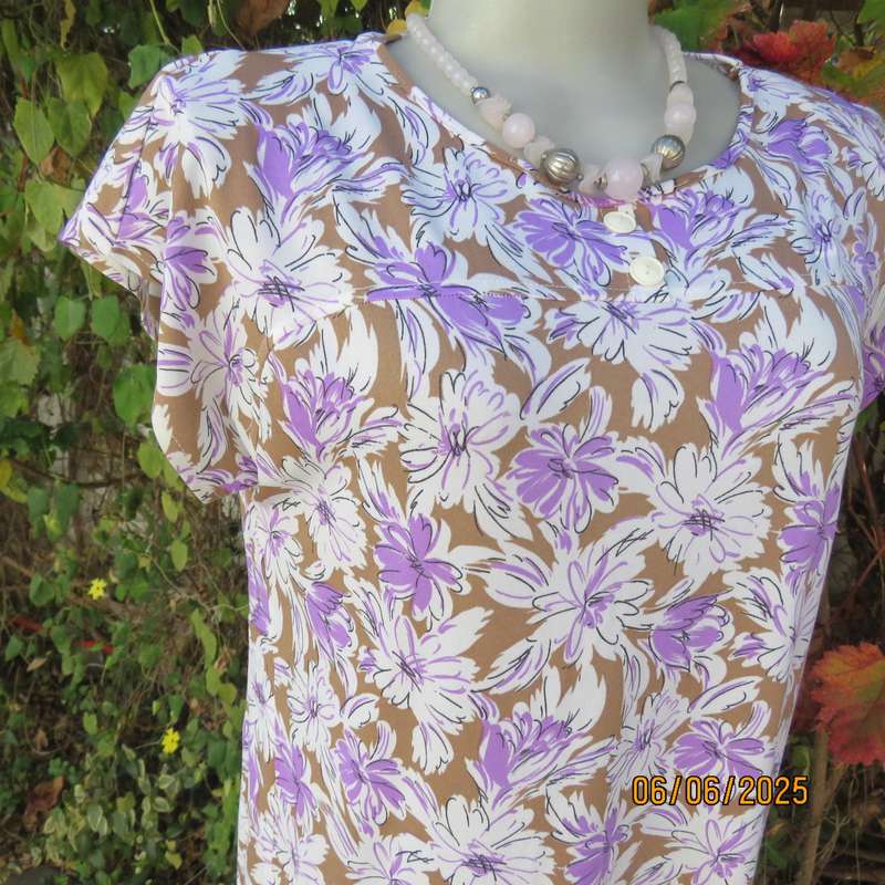 Vintage drop waist stretch polyester dress in tan with white-lilac flowers. Size 38