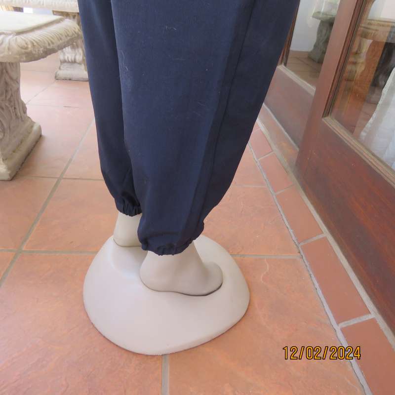 Comfy wide cut navy polyester pants size 38. Front pleats.Elasticated waist -leg hems. Drawstring.
