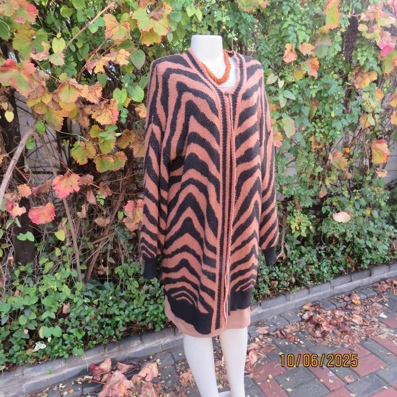 Warm extra long black-tan zig-zag style patterned acrylic knit jacket. Size 40.