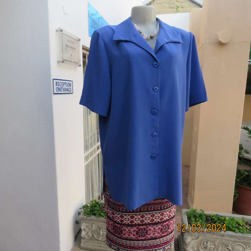 Boutique made cobalt blue 100% polyester button down top-jacket.Button down.Size 42. As new.