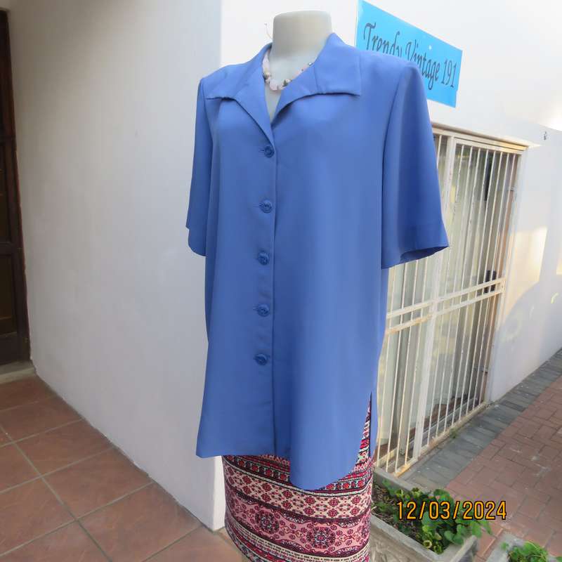 Boutique made cobalt blue 100% polyester button down top-jacket.Button down.Size 42. As new.