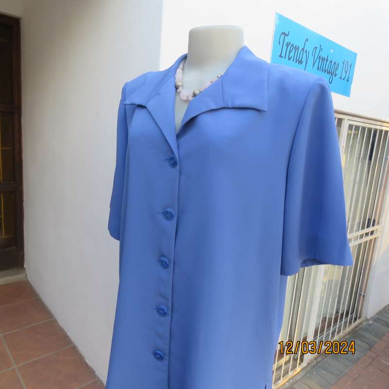 Boutique made cobalt blue 100% polyester button down top-jacket.Button down.Size 42. As new.