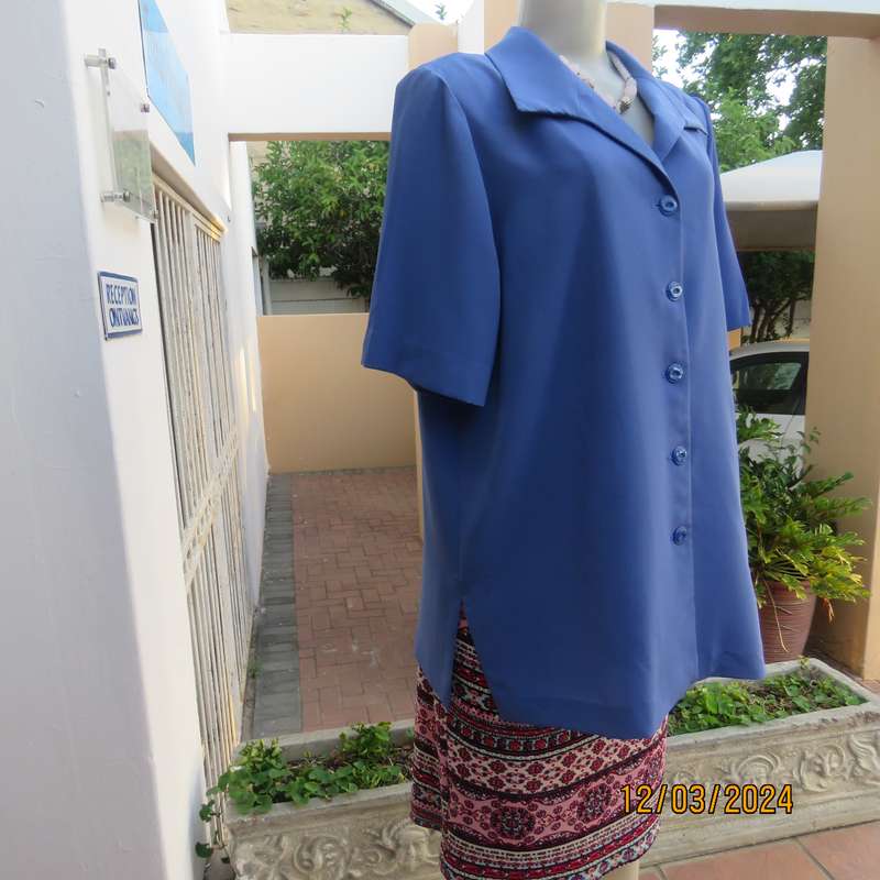 Boutique made cobalt blue 100% polyester button down top-jacket.Button down.Size 42. As new.