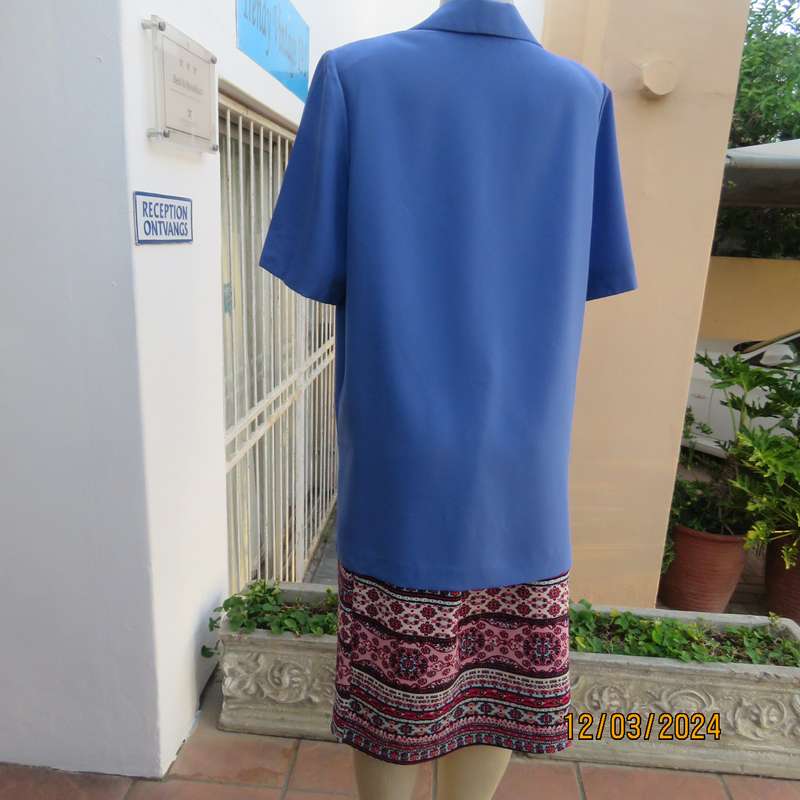 Boutique made cobalt blue 100% polyester button down top-jacket.Button down.Size 42. As new.