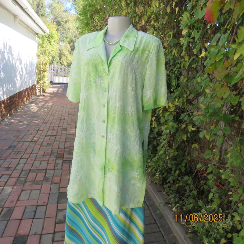Extra long sheer floral embroidered top in shades of thyme green. Size 42.