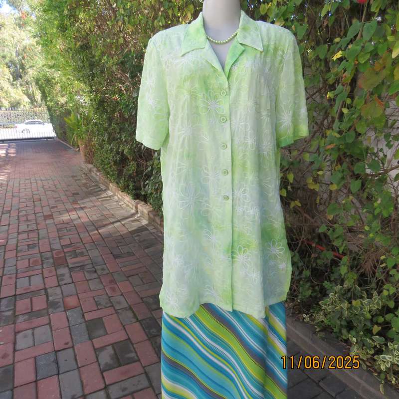 Extra long sheer floral embroidered top in shades of thyme green. Size 42.
