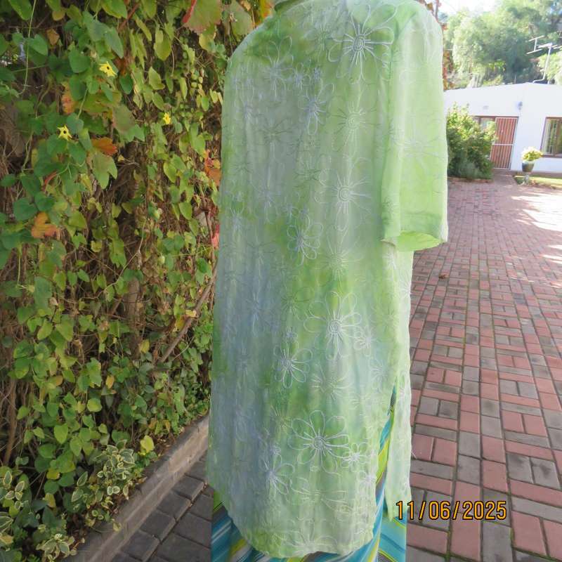 Extra long sheer floral embroidered top in shades of thyme green. Size 42.