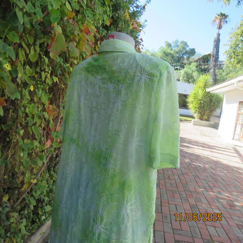 Extra long sheer floral embroidered top in shades of thyme green. Size 42.