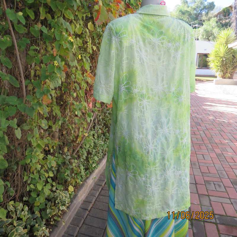 Extra long sheer floral embroidered top in shades of thyme green. Size 42.