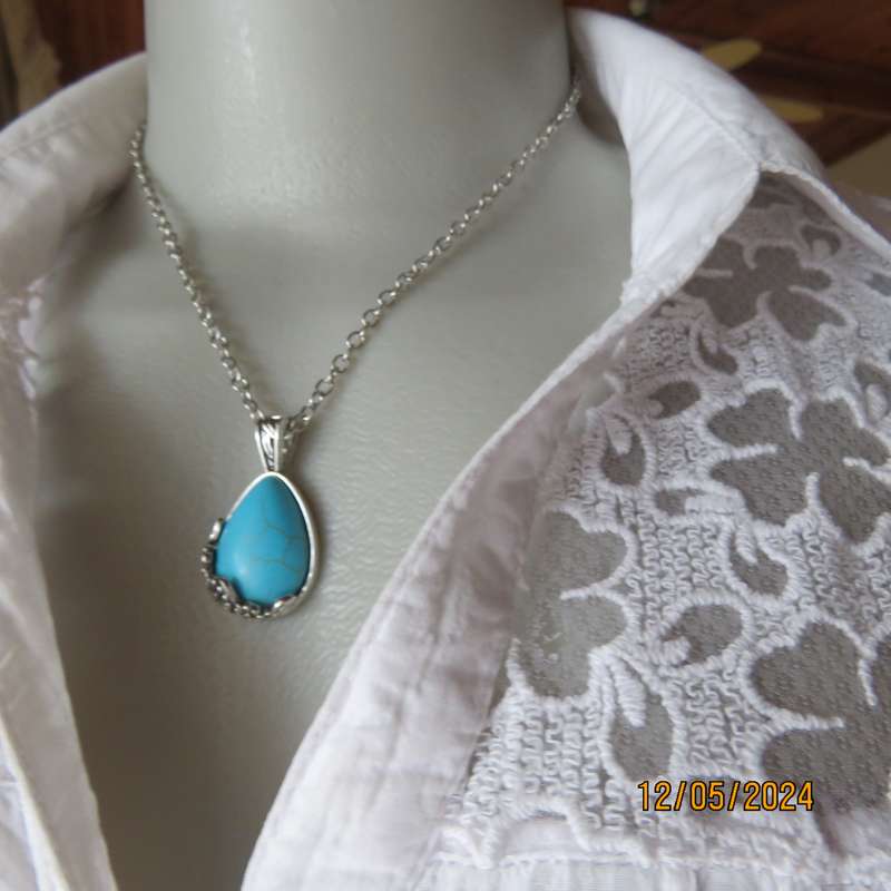 Beautiful fashion silver chain and turquoise stone pendant. Day or evening wear. New item.