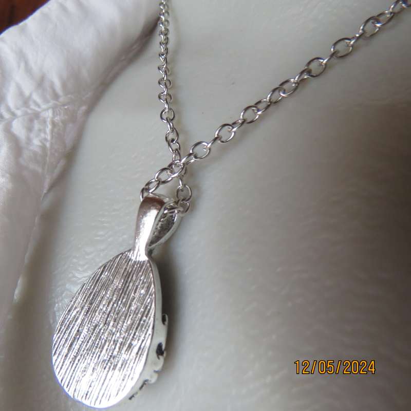 Beautiful fashion silver chain and turquoise stone pendant. Day or evening wear. New item.
