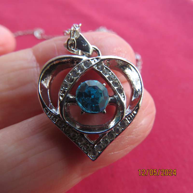 Dainty heart pendant with blue stone and faux diamonds. Silver chain. New item.
