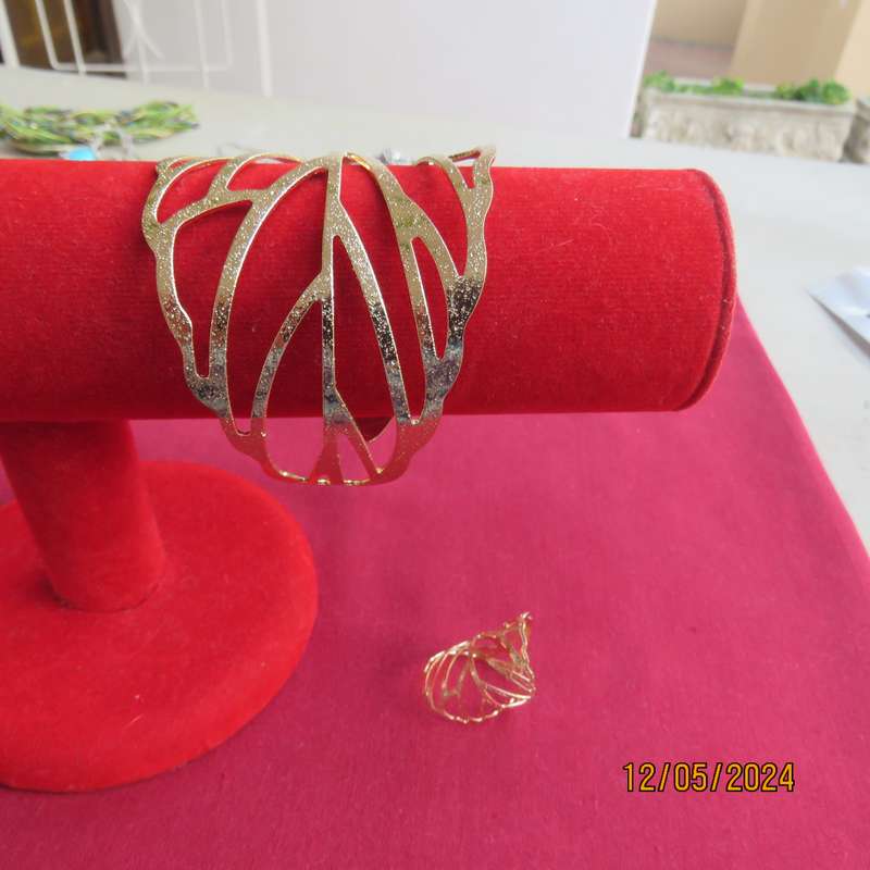 Shiny golden wide unique fashion bangle with matching ring. Fits all. New item