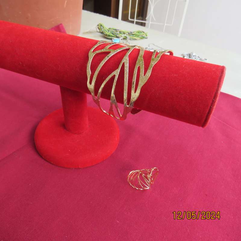 Shiny golden wide unique fashion bangle with matching ring. Fits all. New item