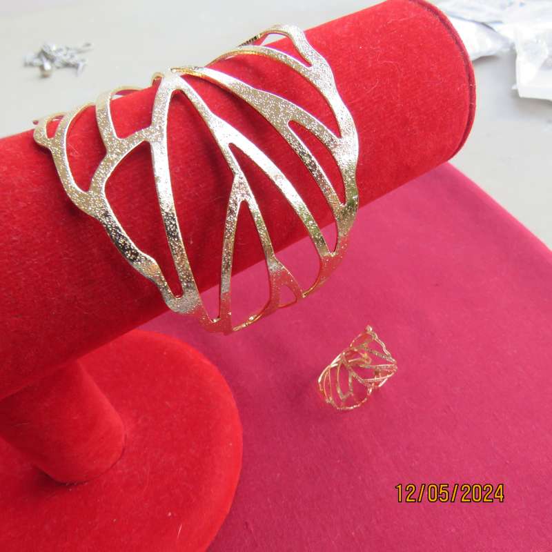 Shiny golden wide unique fashion bangle with matching ring. Fits all. New item