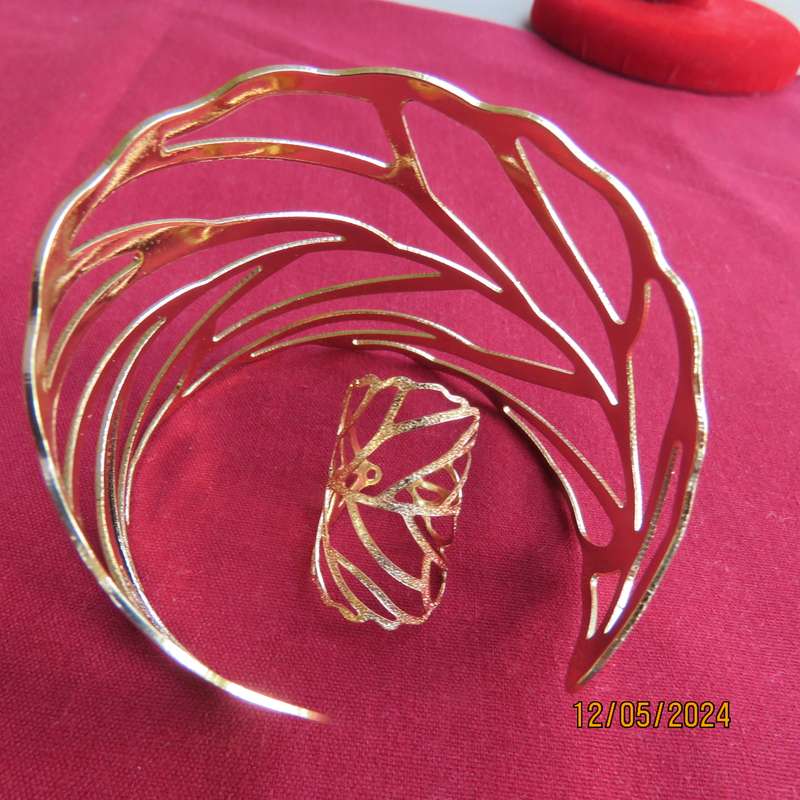 Shiny golden wide unique fashion bangle with matching ring. Fits all. New item