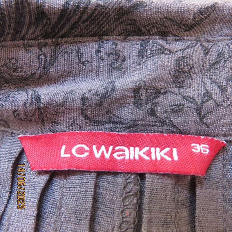 L C WAIKIKI long anchor grey top with darker baroque print. Size 36. Pleats on front-back