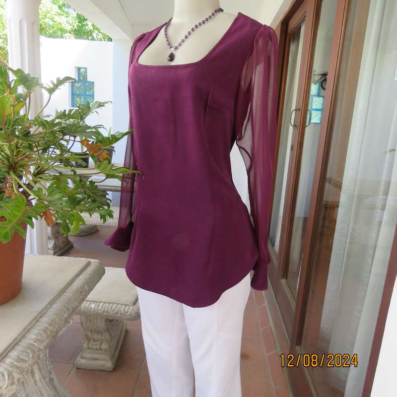 Pretty boutique made purple poly-satin top with long chiffon sleeves. Size 36. As new