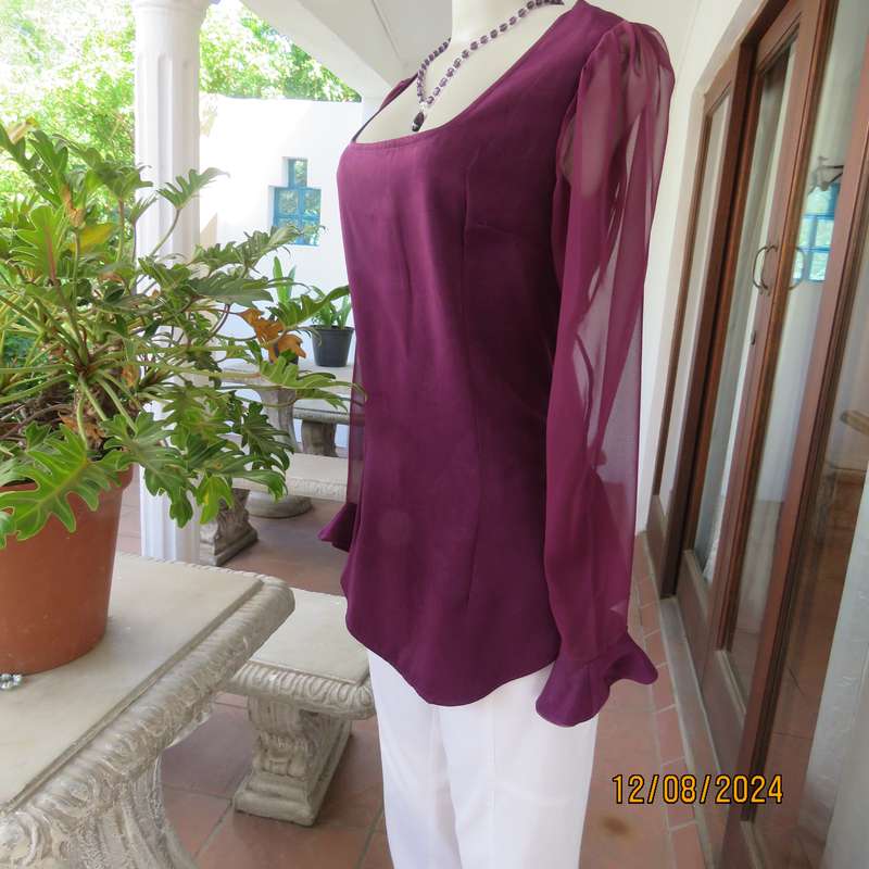 Pretty boutique made purple poly-satin top with long chiffon sleeves. Size 36. As new