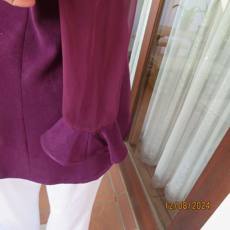 Pretty boutique made purple poly-satin top with long chiffon sleeves. Size 36. As new