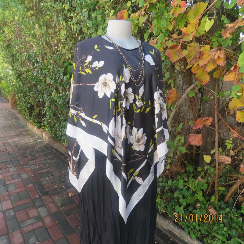 Soft silky black throw over -cream edges and cream flowers. Round neck. New