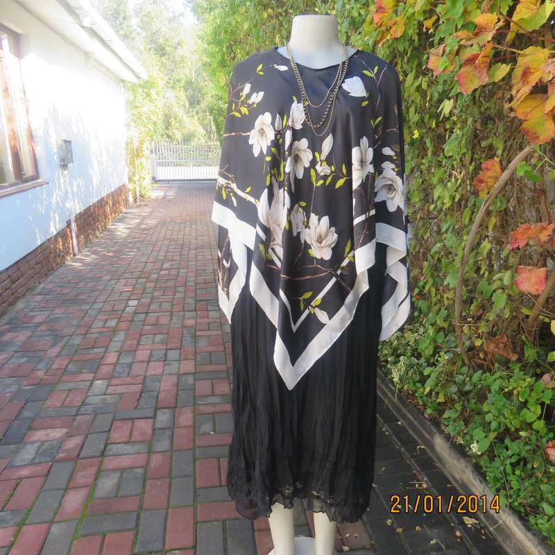 Soft silky black throw over -cream edges and cream flowers. Round neck. New