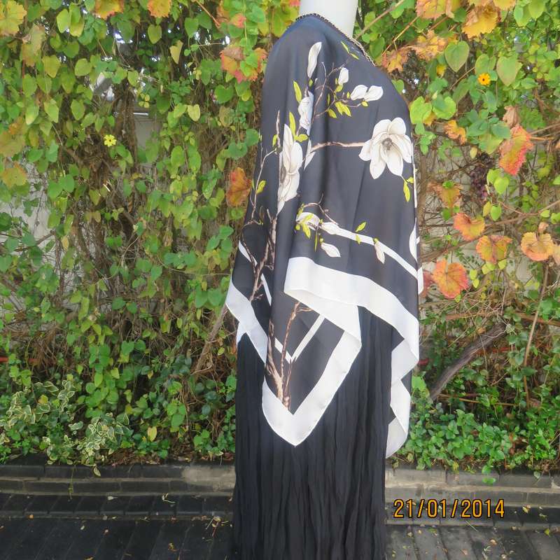 Soft silky black throw over -cream edges and cream flowers. Round neck. New