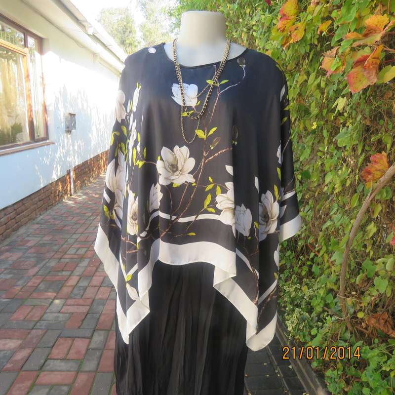 Soft silky black throw over -cream edges and cream flowers. Round neck. New