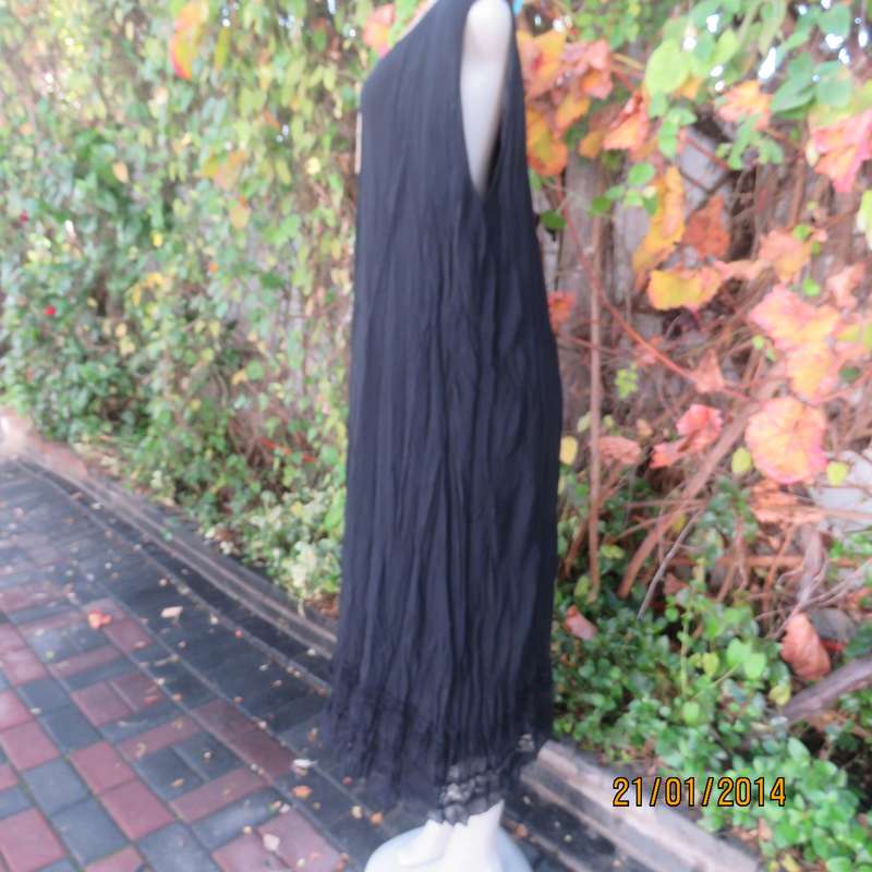 Black slip over vertically creased 2 layer sheer polycotton dress. Size 48
