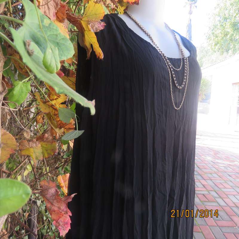 Black slip over vertically creased 2 layer sheer polycotton dress. Size 48