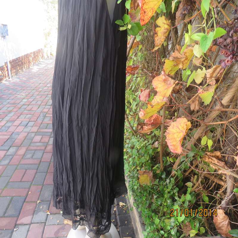 Black slip over vertically creased 2 layer sheer polycotton dress. Size 48
