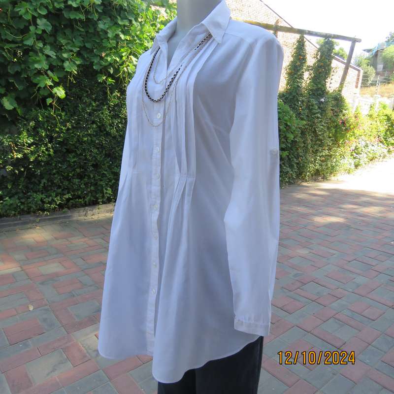 NEWS white 100% cotton long sleeve button down top.V front with open collar.Tucking. Size 36. As new