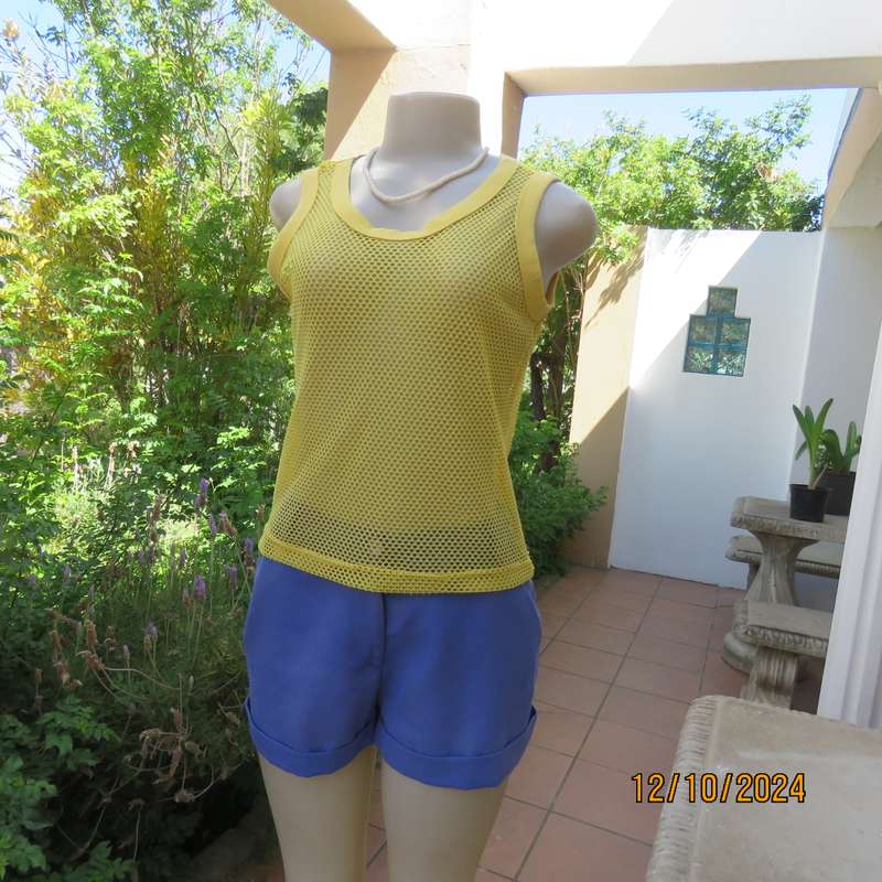 EXS yellow sleeveless mesh slip over top Size 32. Polyester with stretch. As new condition.