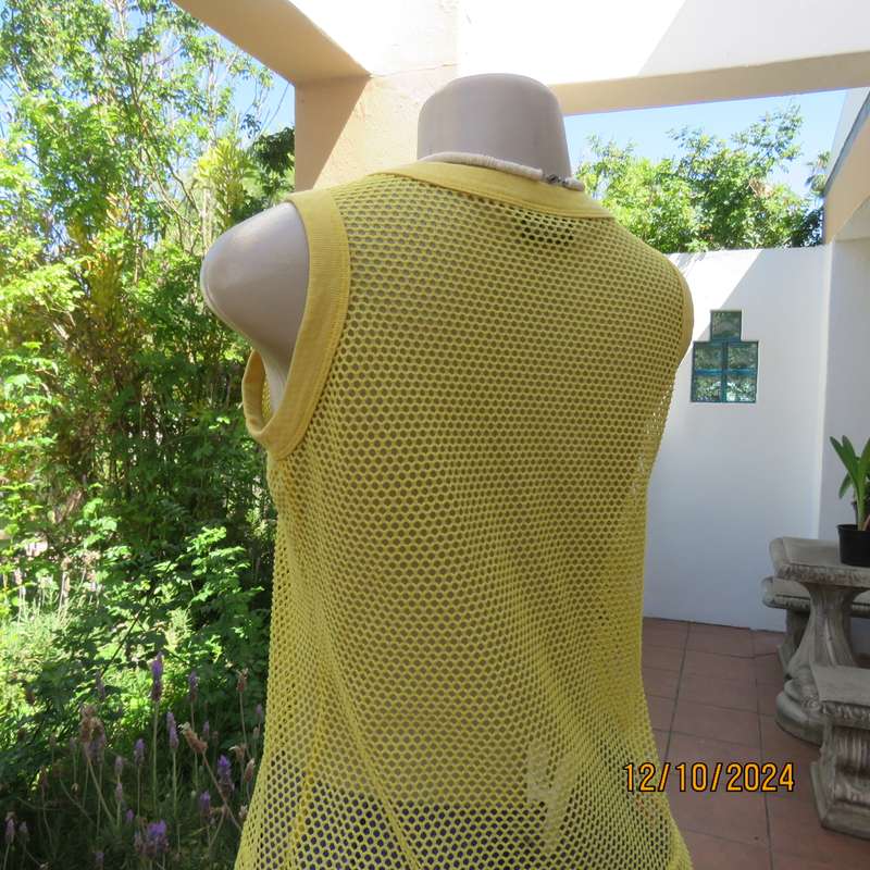 EXS yellow sleeveless mesh slip over top Size 32. Polyester with stretch. As new condition.