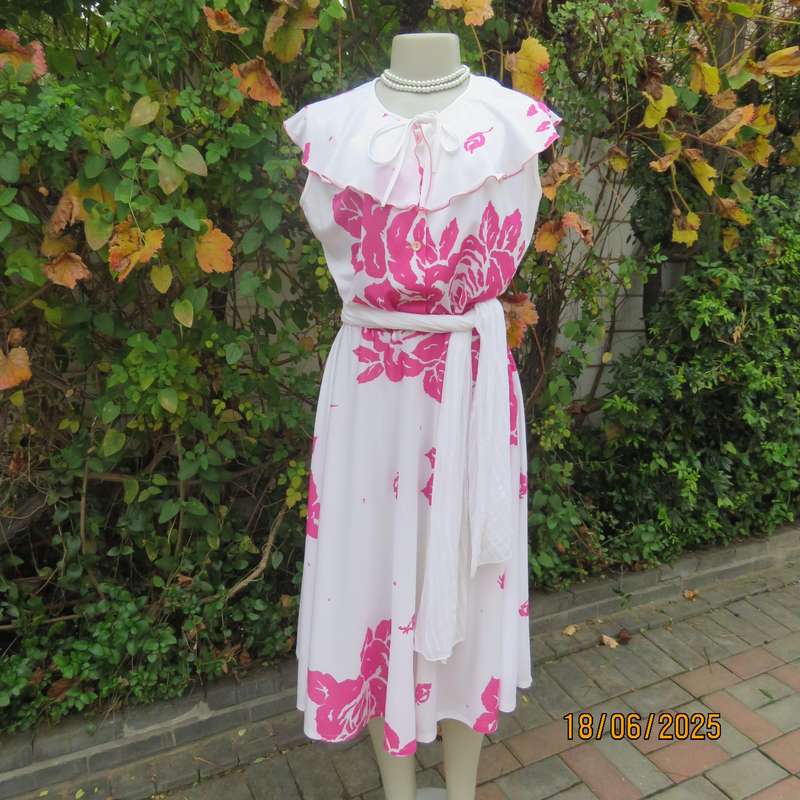 Vintage white poly-nylon stretch dress with bold magenta pink flowers. Size 38