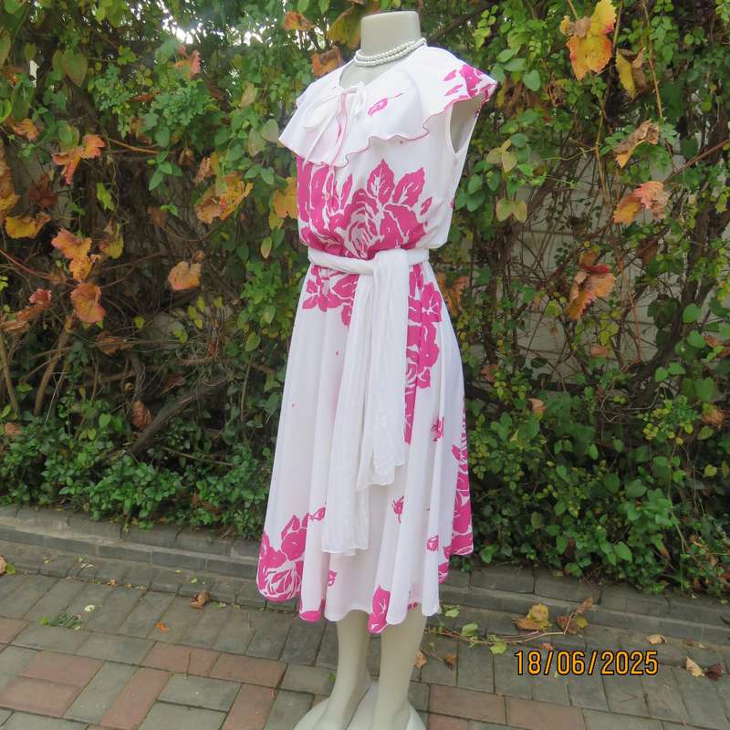 Vintage white poly-nylon stretch dress with bold magenta pink flowers. Size 38