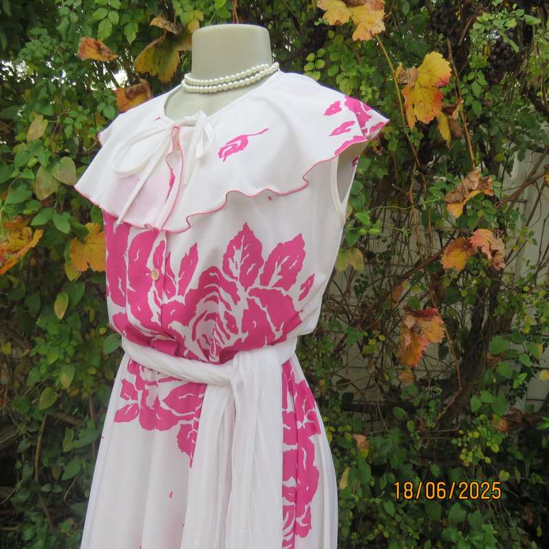 Vintage white poly-nylon stretch dress with bold magenta pink flowers. Size 38