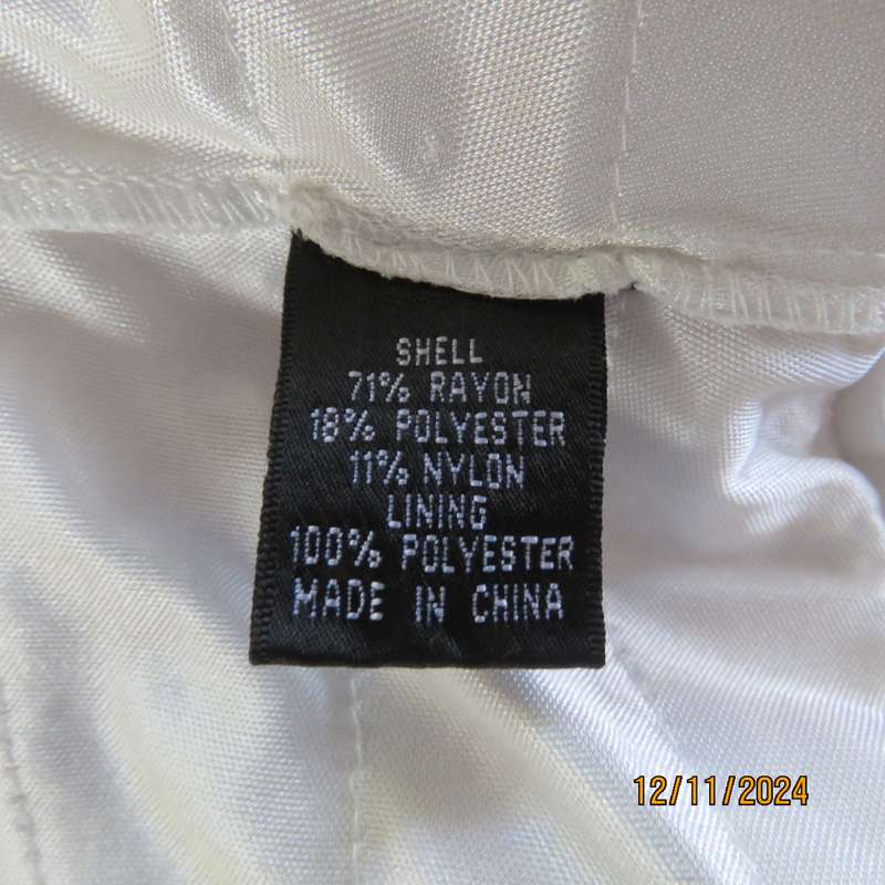 Amazing ADRIANA PAPELL from N Y pinkish white evening top. Zip at back. Frilled all over. Size 35.