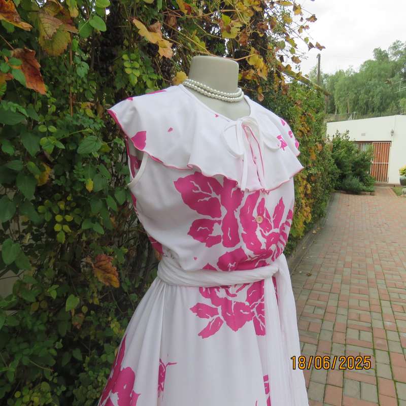 Vintage white poly-nylon stretch dress with bold magenta pink flowers. Size 38