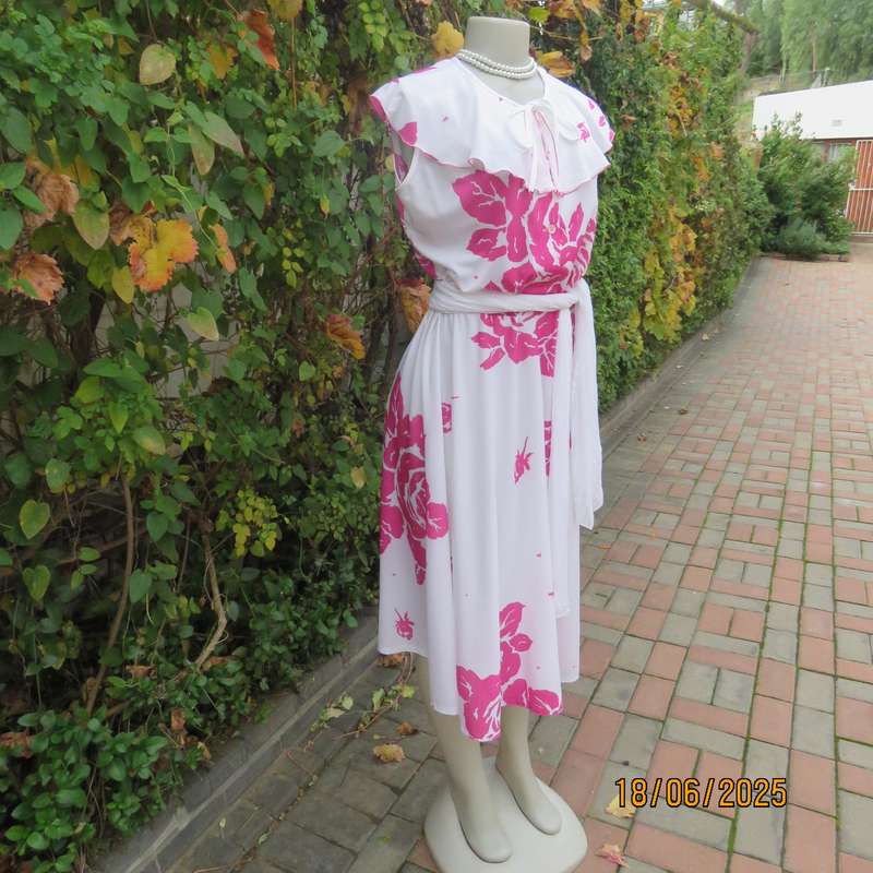 Vintage white poly-nylon stretch dress with bold magenta pink flowers. Size 38
