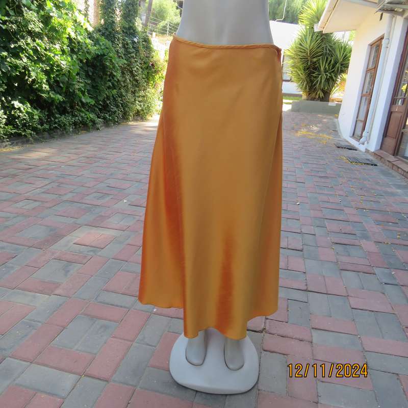 Owner made tangerine shiny satin A-line skirt size 36.Zip at side.Ankle length.Matching possibility