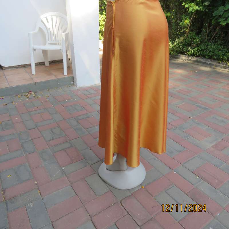 Owner made tangerine shiny satin A-line skirt size 36.Zip at side.Ankle length.Matching possibility