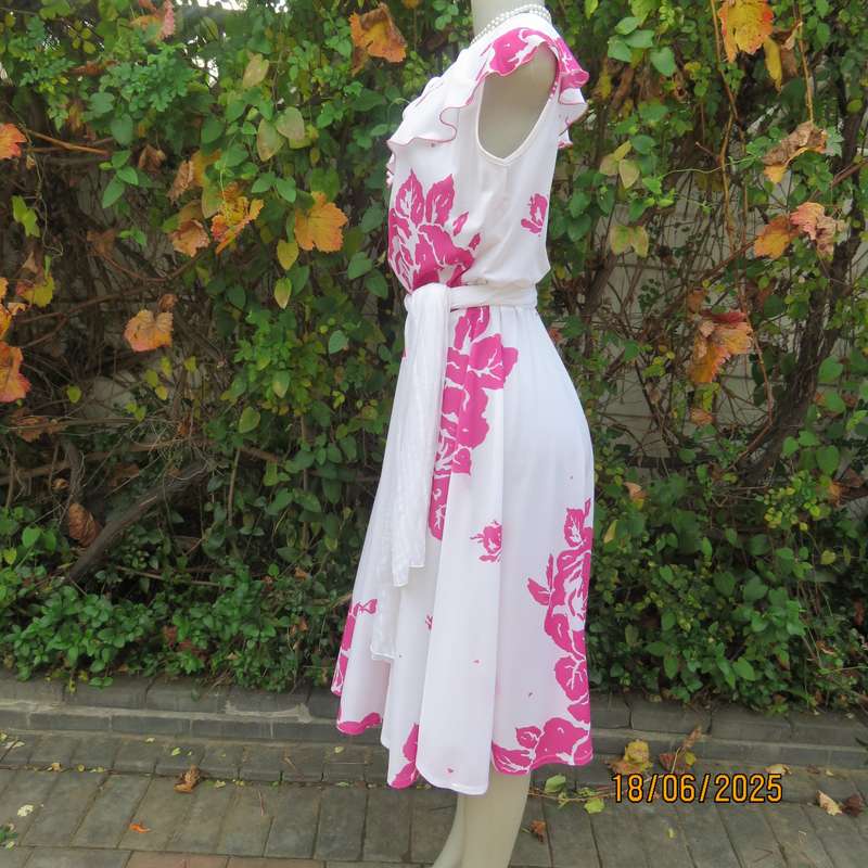 Vintage white poly-nylon stretch dress with bold magenta pink flowers. Size 38