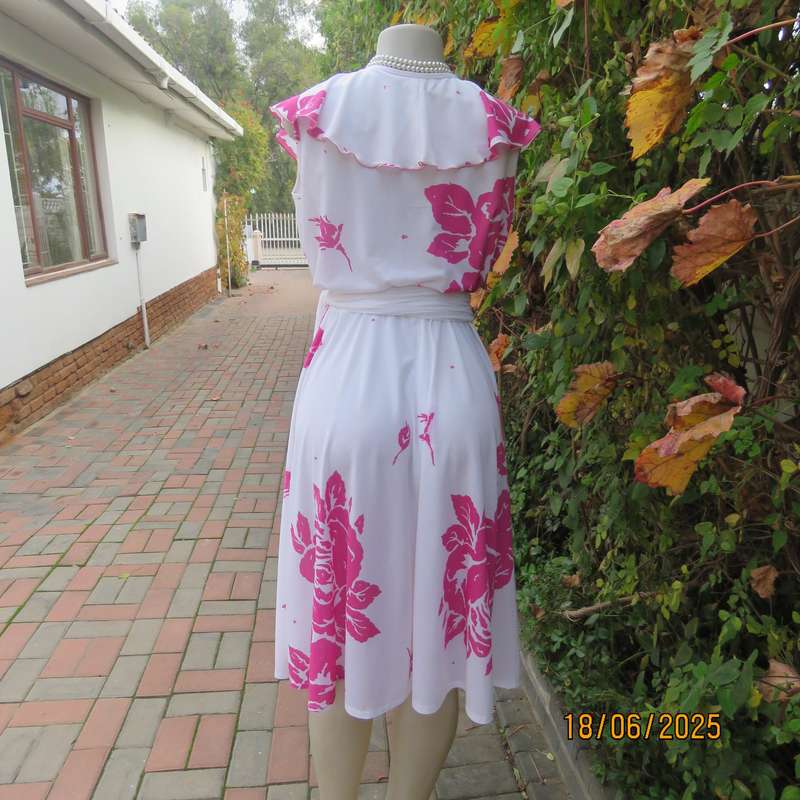 Vintage white poly-nylon stretch dress with bold magenta pink flowers. Size 38