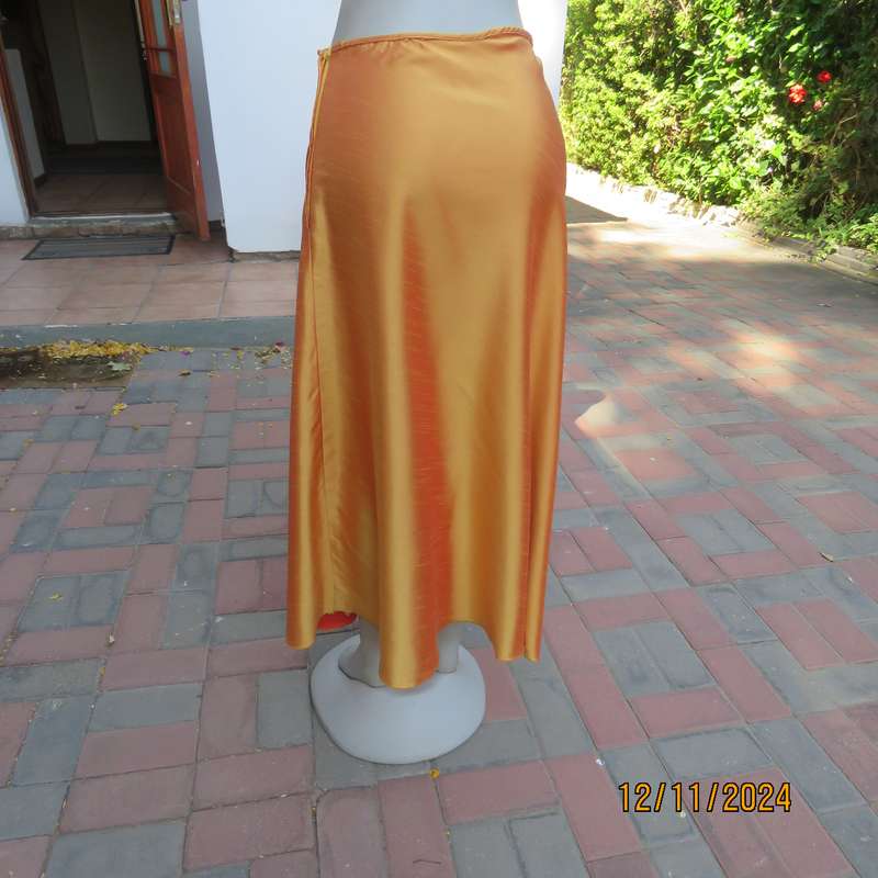 Owner made tangerine shiny satin A-line skirt size 36.Zip at side.Ankle length.Matching possibility