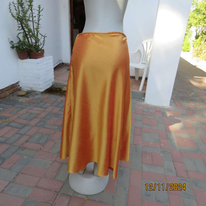 Owner made tangerine shiny satin A-line skirt size 36.Zip at side.Ankle length.Matching possibility