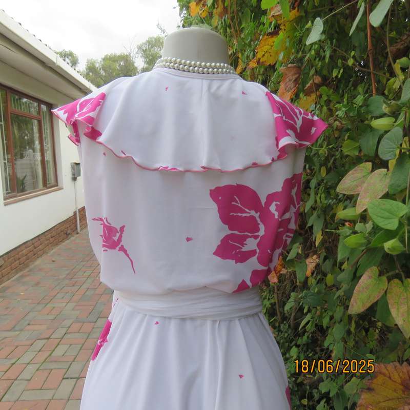 Vintage white poly-nylon stretch dress with bold magenta pink flowers. Size 38