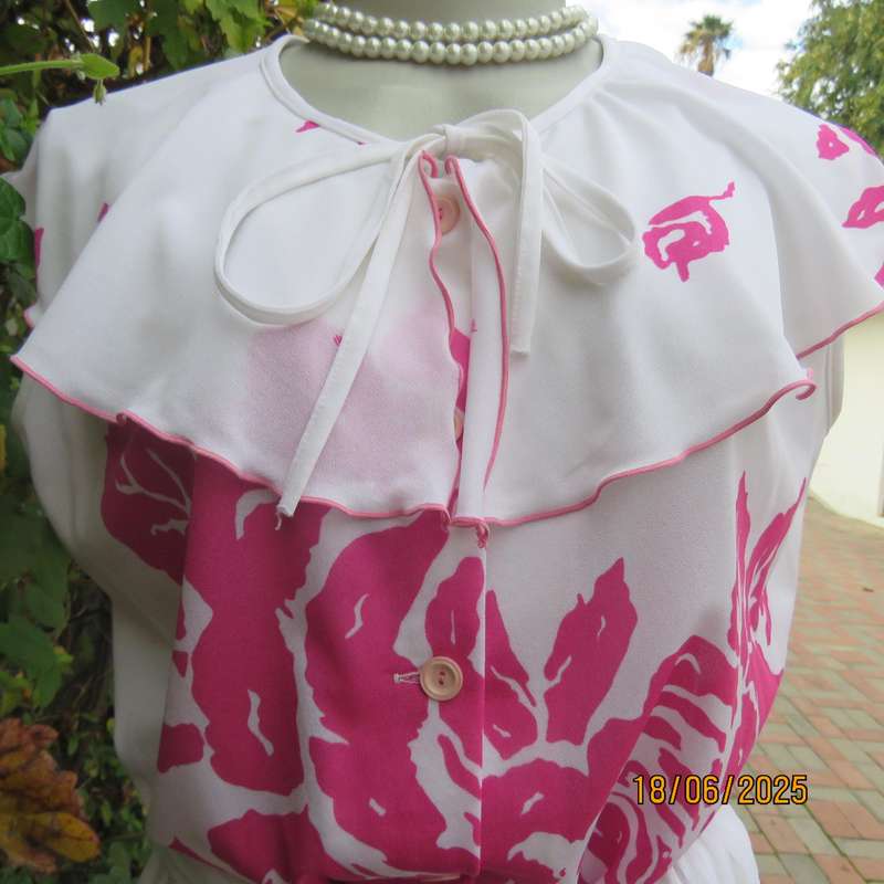 Vintage white poly-nylon stretch dress with bold magenta pink flowers. Size 38