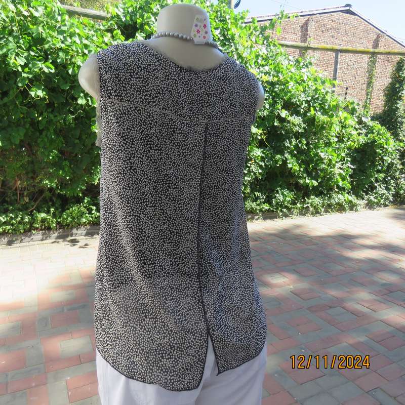 DIMODA Italy sheer black-tiny cream spots sleeveless top Two crossovers at back.Nylon lining.Size 34